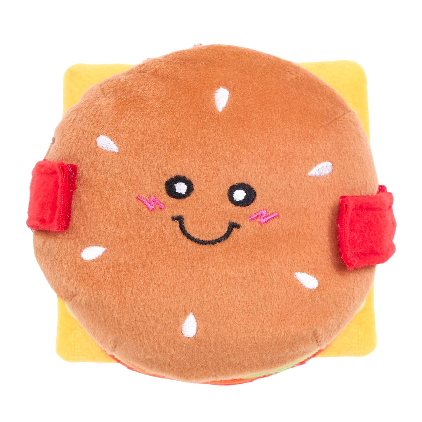 Plush toy shaped like a burger with a smiling face on a white background