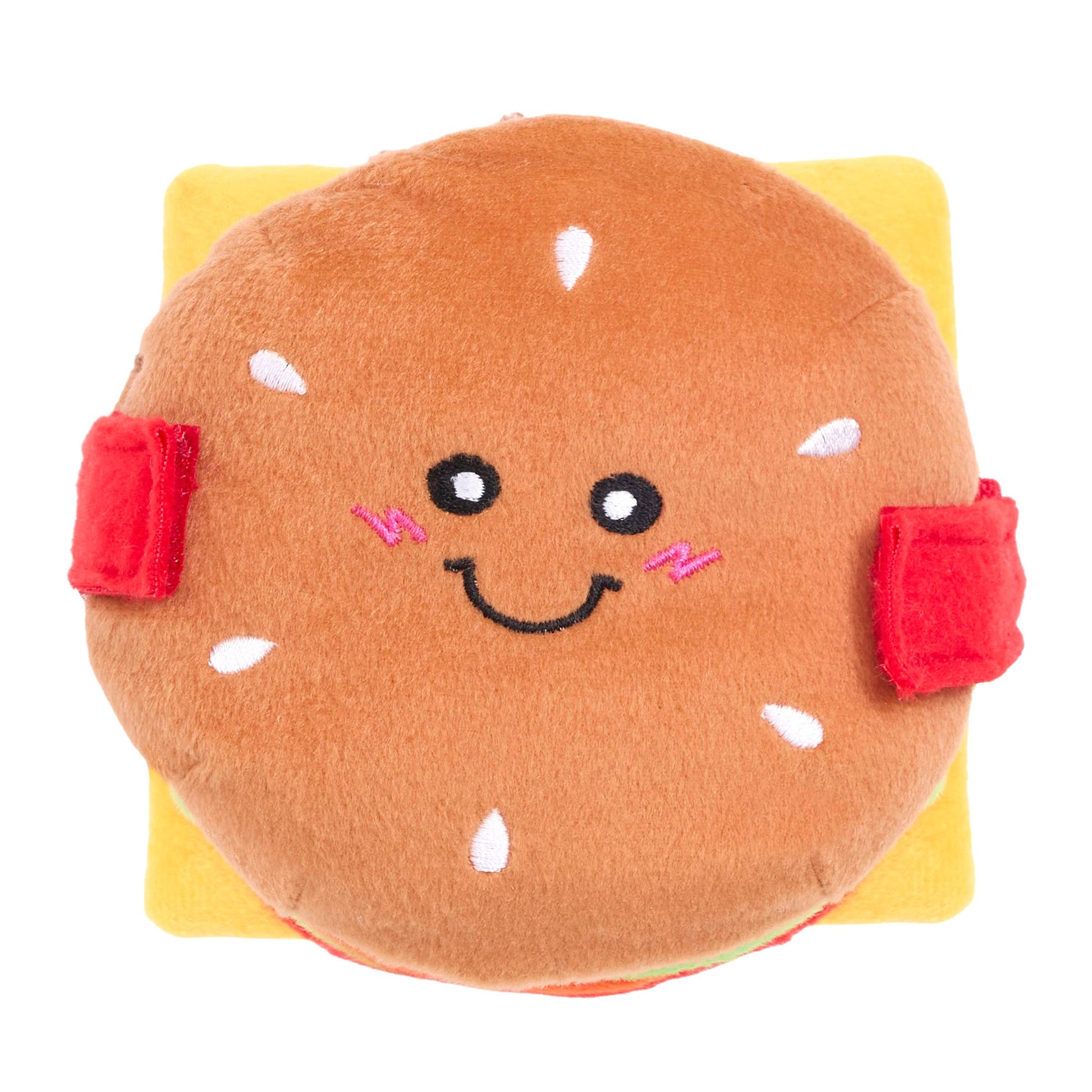 Plush toy shaped like a burger with a smiling face on a white background