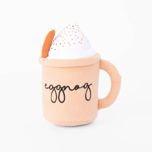 Plush toy resembling a mug of eggnog with a white top on a light gray background