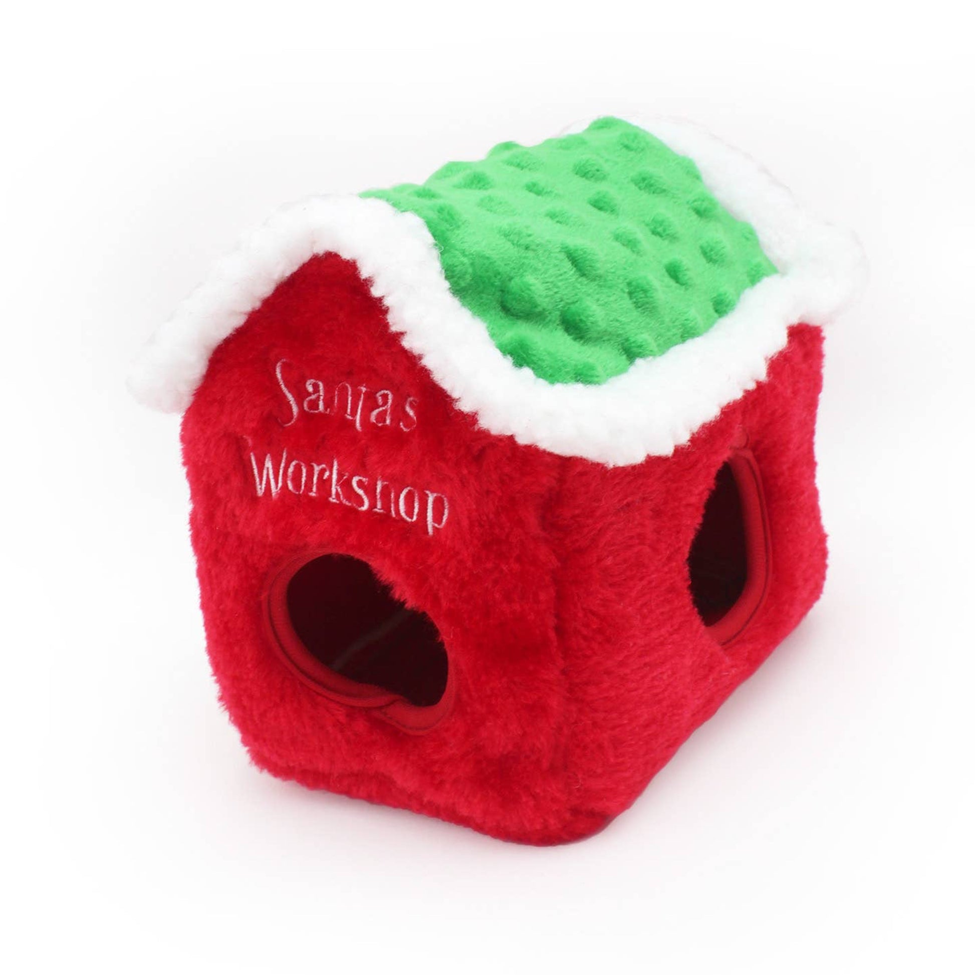 Red and green textured cube toy with 'Santa's Workshop' text on a white background