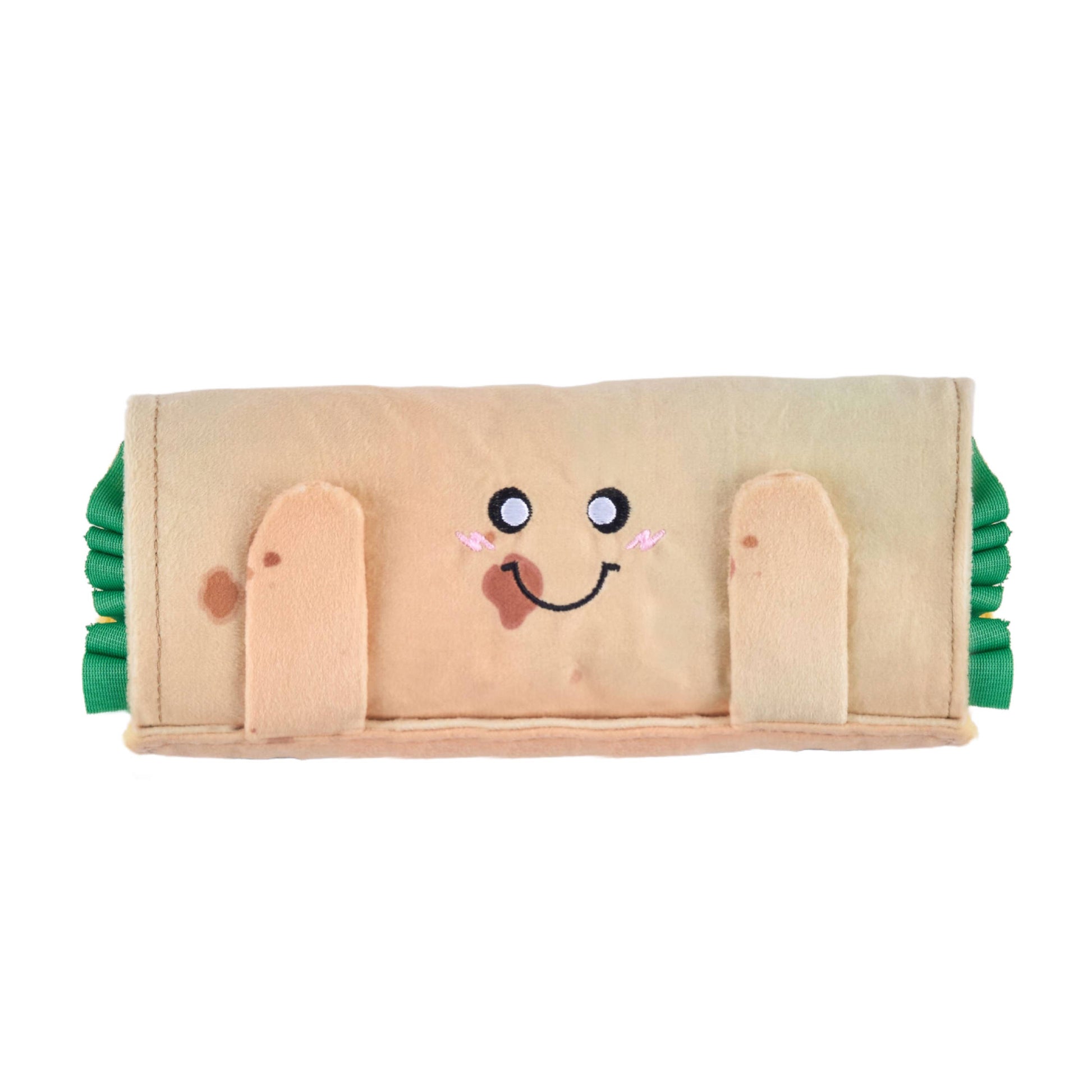 Toy resembling a sandwich with a face on a white background