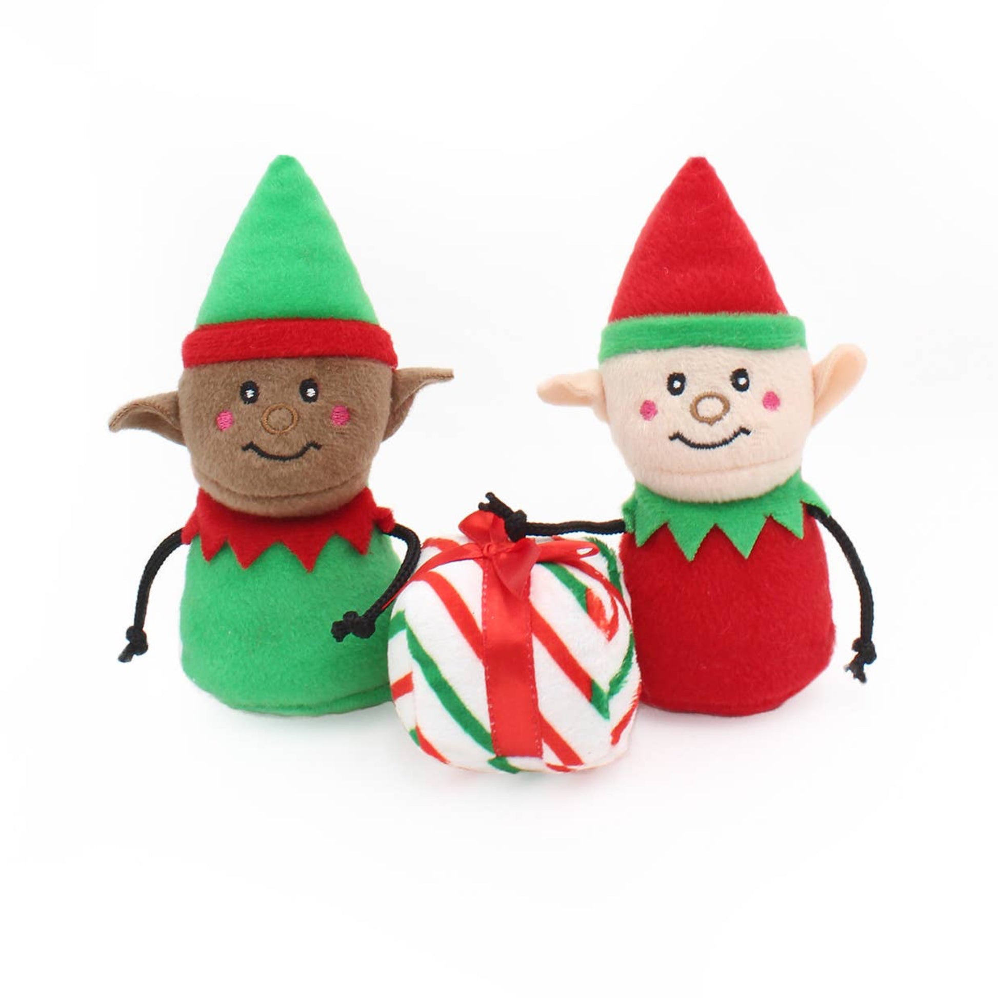 Two Christmas-themed elf toys with a candy cane plush toy between them on a white background.