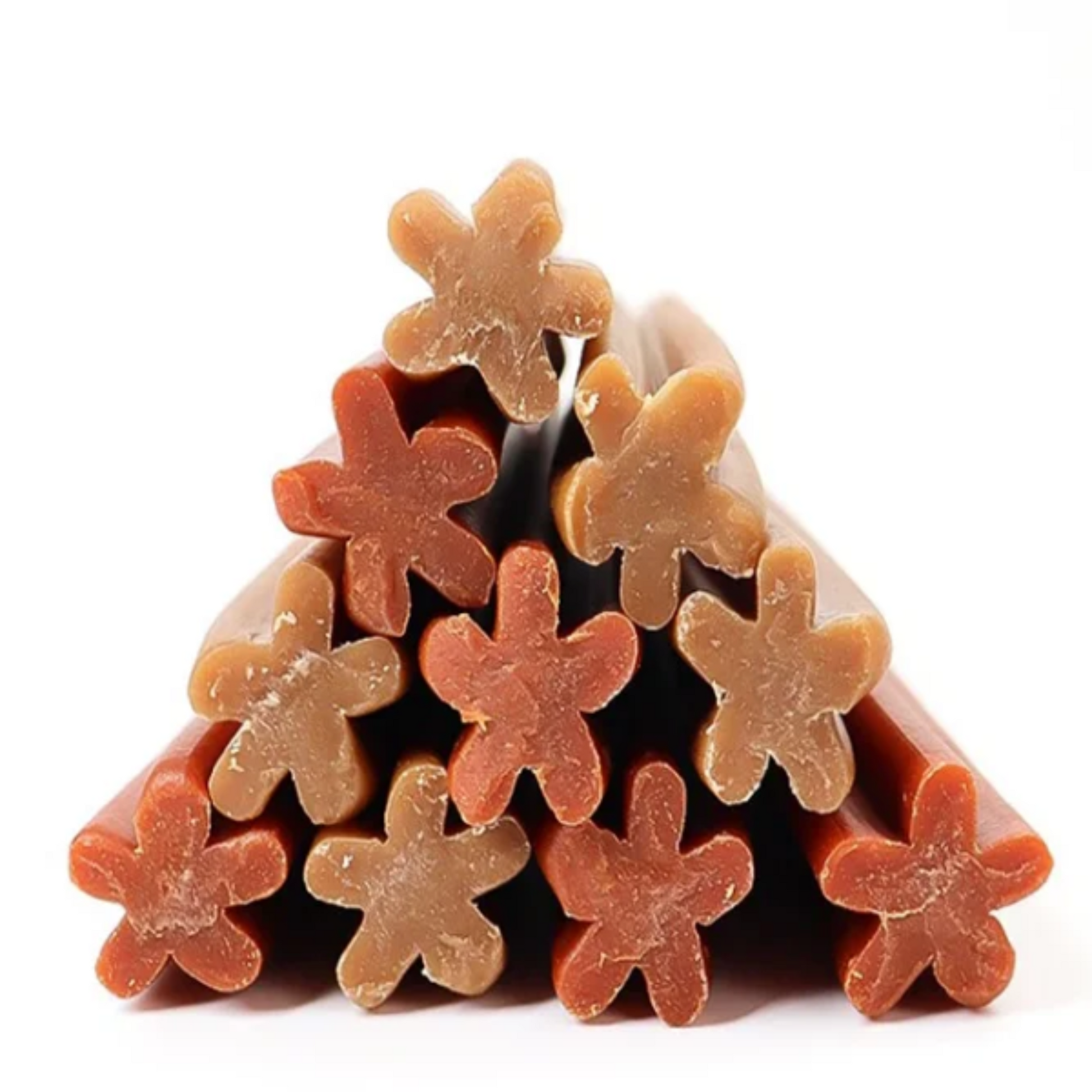 Stack of star-shaped gummy dental chews for dogs on a white background